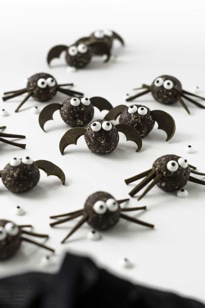 monster energy balls that look like little spiders on a white surface 