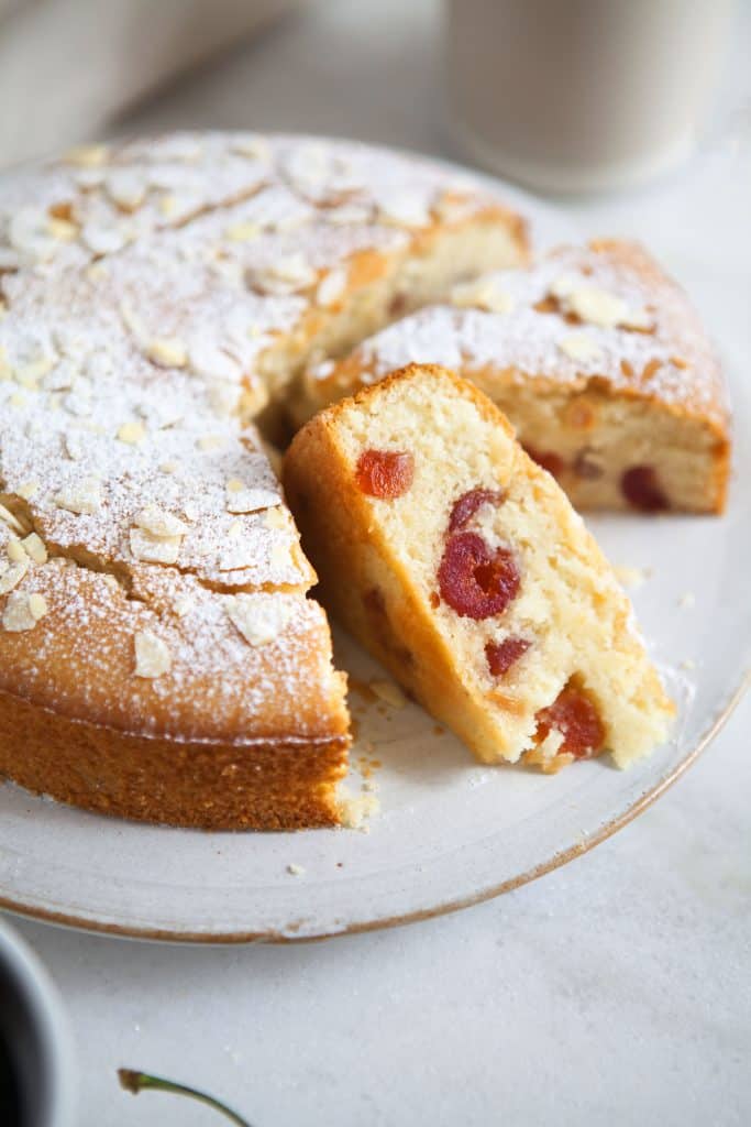 Vegan Cake with Cherries and Almonds on a Plate