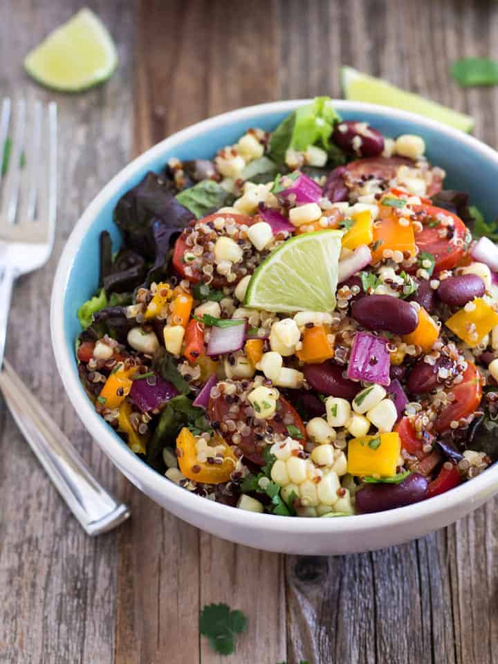 Summer Corn and Quinoa Veggie Salad with Lime Slices on Top