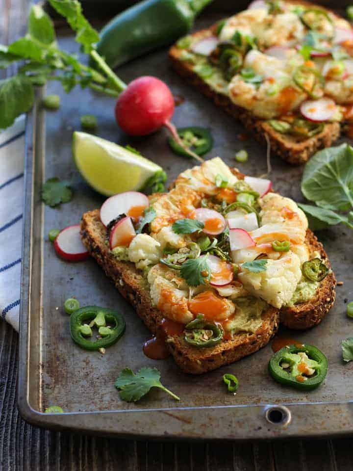 Spicy Avocado Cauliflower Toasts with Lime and Cilantro on the Side