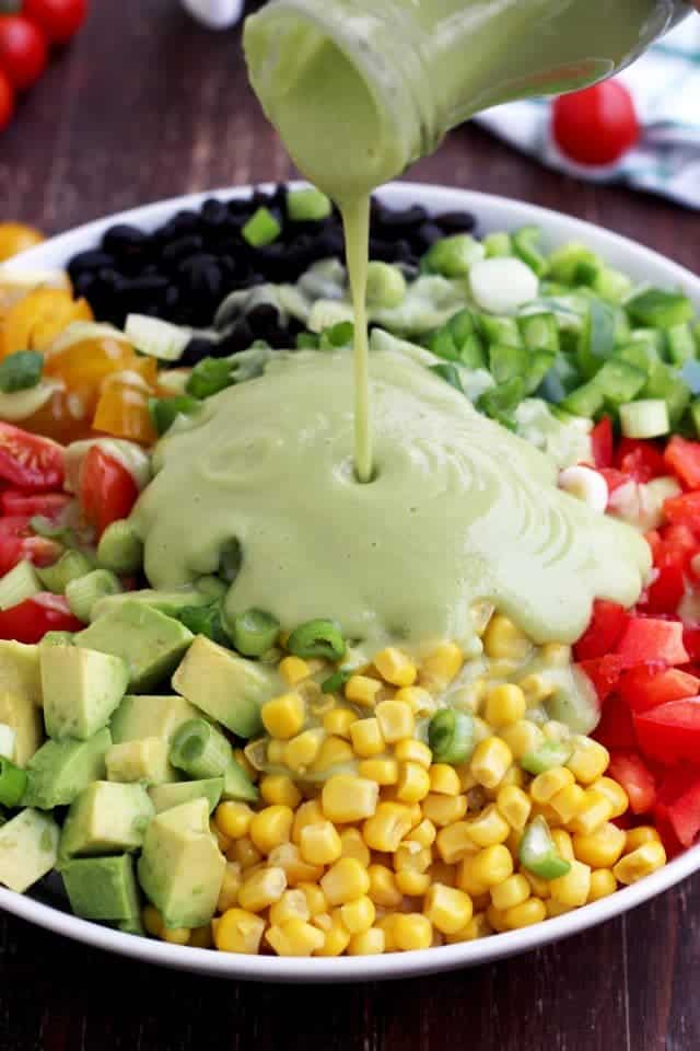 Vegan Mexican Chopped Salad with Dressing Poured Over