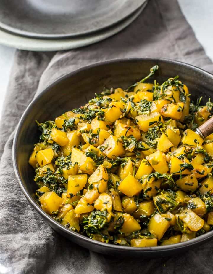 Aloo Methi in a Bowl with a Fork