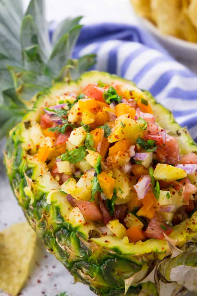 Pineapple Salsa in a Pineapple Bowl with Tortilla Chips