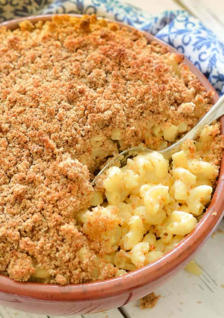 A Casserole Dish of Baked Vegan Mac and Cheese with a Spoon