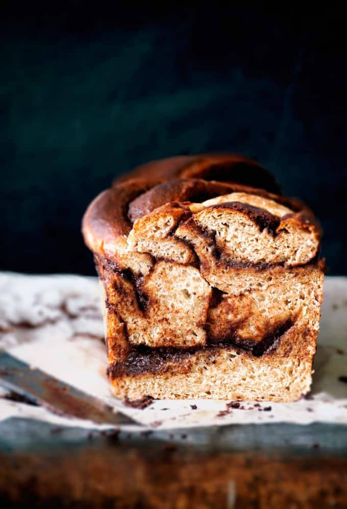 Chocolate Banana Babka on a dark wooden surface 