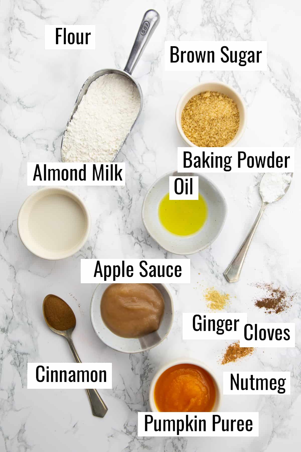 ingredients that go into this recipe on a marble countertop with labels 