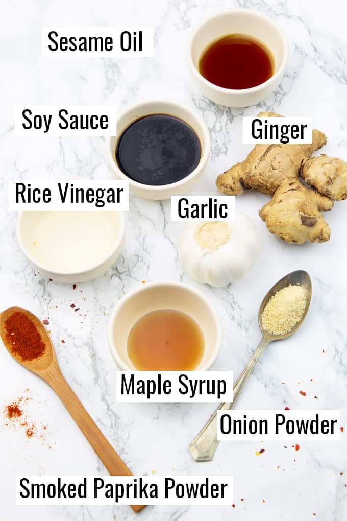 ingredients that go into this recipe on a marble countertop with labels 