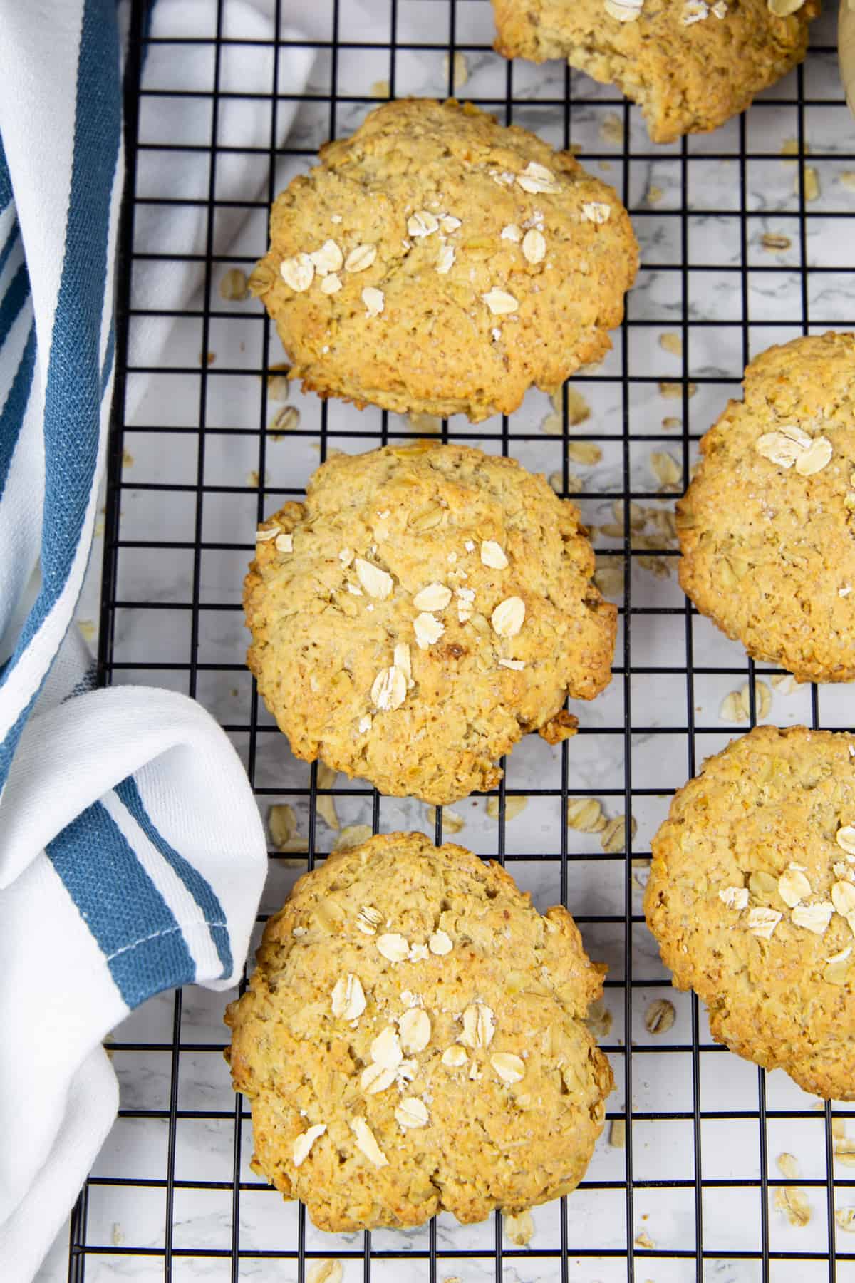 six vegan oatmeal cookies on a cooling rack 