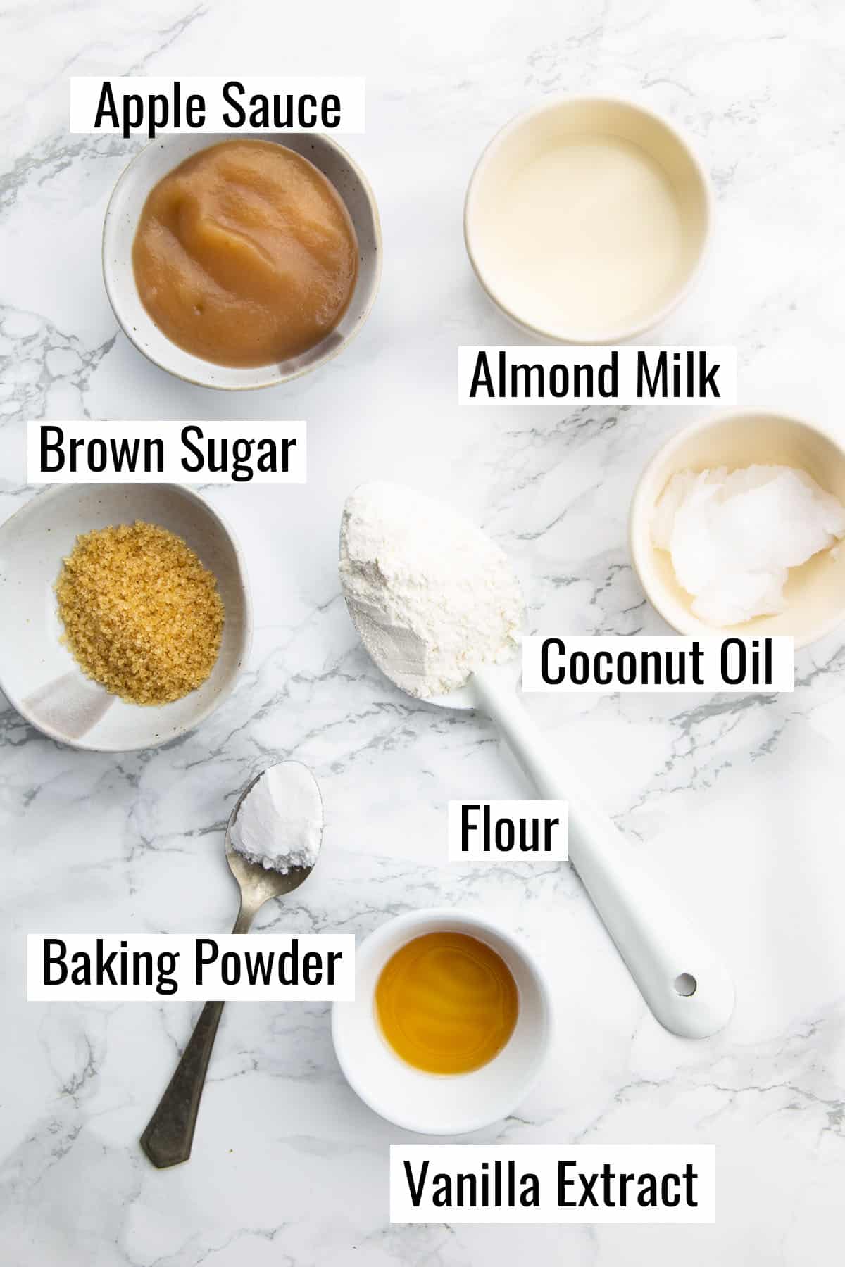 ingredients that go into this recipe on a marble counter with labels 