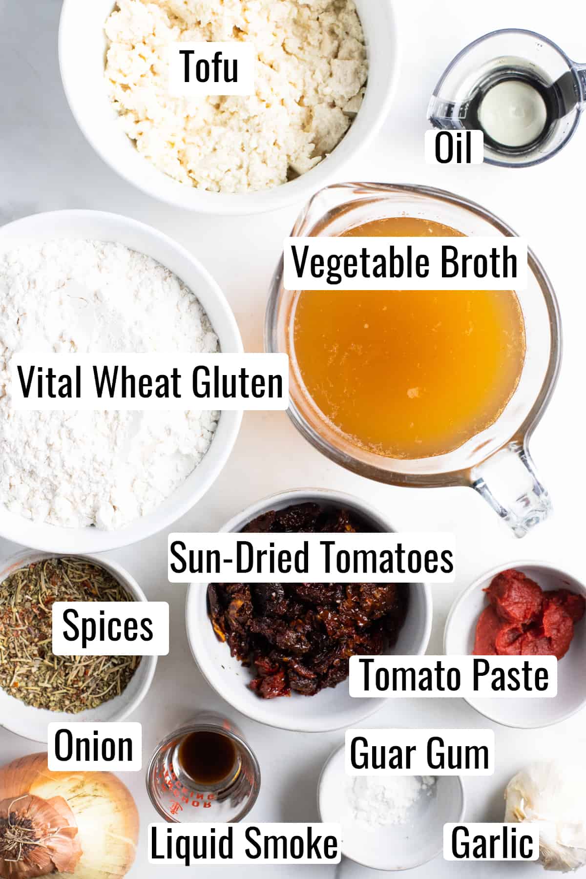 the ingredients that go into this recipe on a marble countertop with labels 
