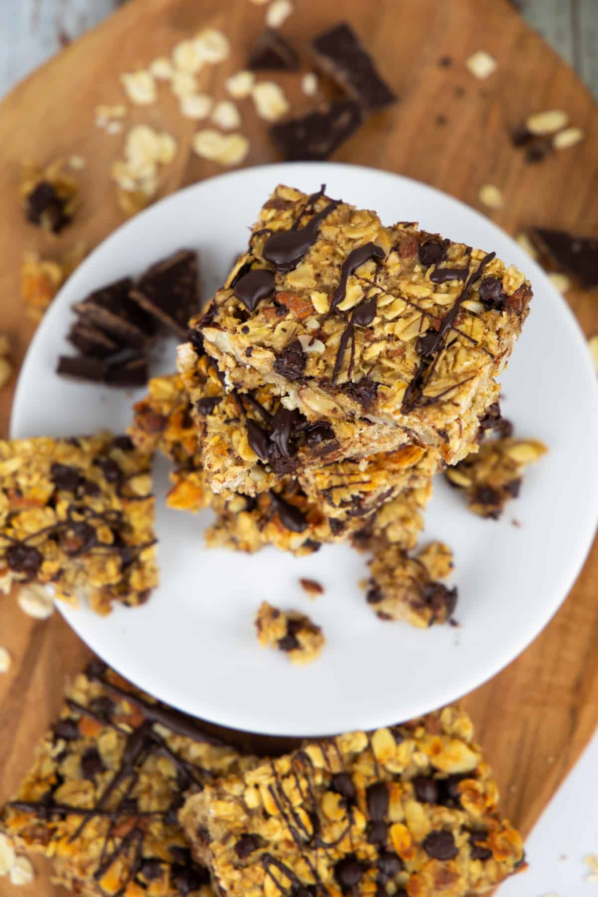 a stack of healthy granola bars on a white plate