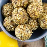 Turmeric Energy Balls in a blue bowl with a text overlay
