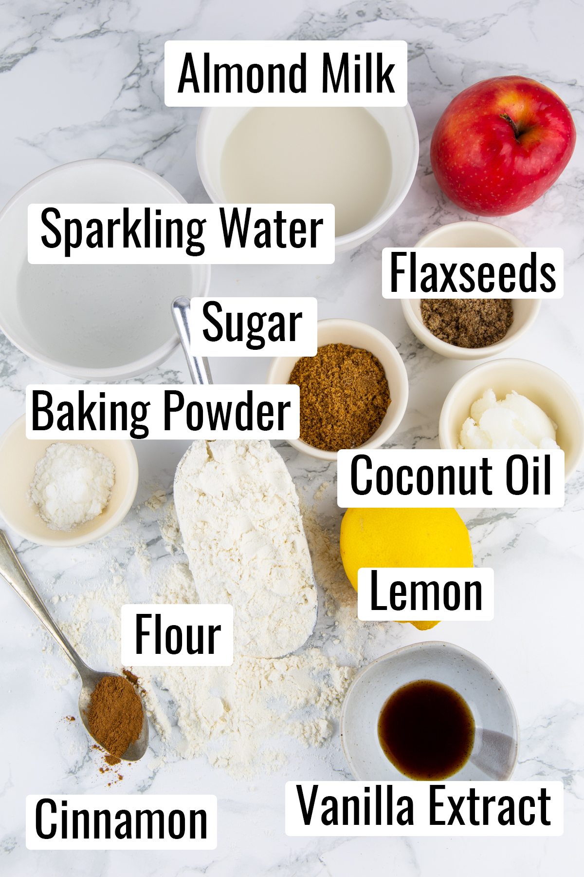 the ingredients that go into this recipe on a marble countertop with the name of each ingredient 